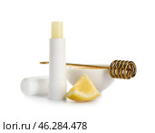 Natural lip balm with honey and lemon on white background. Стоковое фото, фотограф Pixel_shot / Фотобанк Лори