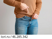 Young man with urologic disease on light background. Стоковое фото, фотограф Pixel_shot / Фотобанк Лори