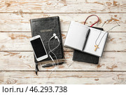 Composition with Holy Bible and mobile phone on wooden background. Стоковое фото, фотограф Pixel_shot / Фотобанк Лори