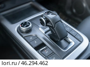 Automatic transmission in close-up in the interior of an SUV. The design and functionality of modern car gear shifts enhance the driving experience significantly. Стоковое фото, фотограф Владимир Разгуляев / Фотобанк Лори