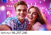 A happy young couple takes a selfie against the backdrop of bright garlands and sparkling snowflakes, conveying an atmosphere of joy, coziness and festive mood. Стоковое AI-изображение, AI-художник ArtVladZ / Фотобанк Лори