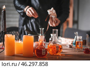 Male alchemist making elixir in laboratory. Стоковое фото, фотограф Pixel_shot / Фотобанк Лори