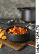 Bowl with tasty pasta and beans on table. Стоковое фото, фотограф Pixel_shot / Фотобанк Лори
