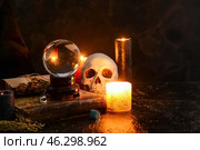 Accessories of fortune teller on table. Стоковое фото, фотограф Pixel_shot / Фотобанк Лори