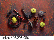 Parts of hookah and apples on grunge background. Стоковое фото, фотограф Pixel_shot / Фотобанк Лори