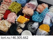 Box is filled with multicolored tapes for handmade. Стоковое фото, фотограф Mariana Rusanovschi / Фотобанк Лори