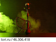 Hookah with fume on dark background. Стоковое фото, фотограф Pixel_shot / Фотобанк Лори