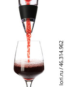 Pouring of wine from aerator into glass on white background. Стоковое фото, фотограф Pixel_shot / Фотобанк Лори