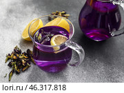 Cup of butterfly pea flower tea on grunge background. Стоковое фото, фотограф Pixel_shot / Фотобанк Лори