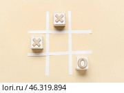 Tic-tac-toe game on color background. Стоковое фото, фотограф Pixel_shot / Фотобанк Лори