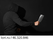 Maniac with cleaver on black background. Стоковое фото, фотограф Pixel_shot / Фотобанк Лори