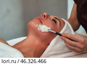 Pampering Session Highlights Soothing Facial Treatment in a Tranquil Spa Setting. Стоковое фото, фотограф Aleksandr Golubev / Фотобанк Лори