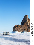 LAKE BAIKAL, OLKHON ISLAND, IRKUTSK REGION, RUSSIA -  February 22, 2025: Tourists love to come across ice of frozen Lake Baikal to famous Cape Khoboy - natural landmark of Olkhon Island. Редакционное фото, фотограф Виктория Катьянова / Фотобанк Лори