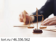 Scales of justice at workplace of notary public. Стоковое фото, фотограф Pixel_shot / Фотобанк Лори