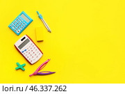 Composition with calculators on color background. Стоковое фото, фотограф Pixel_shot / Фотобанк Лори