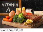 Set of healthy products rich in vitamin A on dark background. Стоковое фото, фотограф Pixel_shot / Фотобанк Лори
