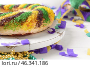 Festive cake for Mardi Gras (Fat Tuesday) holiday on white table. Стоковое фото, фотограф Pixel_shot / Фотобанк Лори