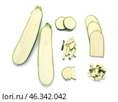 Cut zucchini squashes on white background. Стоковое фото, фотограф Pixel_shot / Фотобанк Лори