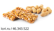 Tasty peanut brittle on white background. Стоковое фото, фотограф Pixel_shot / Фотобанк Лори