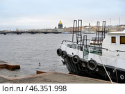A fragment of a longboat moored on the Neva River in St. Petersburg, Russia, in autumn. Стоковое фото, фотограф Сергей Фролов / Фотобанк Лори