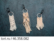 Handmade cotton keychains on dark background. Стоковое фото, фотограф Pixel_shot / Фотобанк Лори