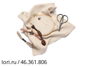 Embroidery hoop with canvas, scissors and mouline threads isolated on white background. Стоковое фото, фотограф Pixel_shot / Фотобанк Лори