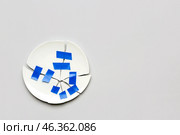 Broken plate with adhesive tape on light background. Стоковое фото, фотограф Pixel_shot / Фотобанк Лори
