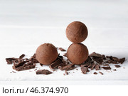 Tasty sweet truffles on white table. Стоковое фото, фотограф Pixel_shot / Фотобанк Лори