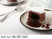 Plate with tasty lava cake fondant on white background, closeup. Стоковое фото, фотограф Pixel_shot / Фотобанк Лори