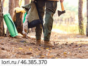 Male tourist with survival kit in forest. Стоковое фото, фотограф Pixel_shot / Фотобанк Лори