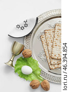 Composition with Passover Seder plate on white background. Стоковое фото, фотограф Pixel_shot / Фотобанк Лори