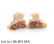 Cut tasty dumpling on white background. Стоковое фото, фотограф Pixel_shot / Фотобанк Лори
