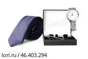 Stylish necktie, cufflinks and wristwatch on white background. Стоковое фото, фотограф Pixel_shot / Фотобанк Лори