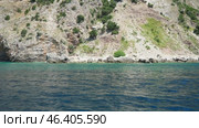 Pecina cave, beach Miina plaza, Bar Montenegro. Hills, inaccessible rocks. Flysch, marine sedimentary rocks, lithological layers. Adriatic Mediterranean. Boat trip on the sea. Summer sea tourism (2024 год). Стоковое видео, видеограф Юлия Петровская / Фотобанк Лори
