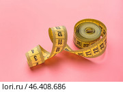 Measuring tape on color background. Стоковое фото, фотограф Pixel_shot / Фотобанк Лори