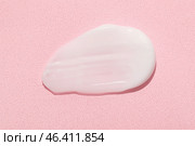 Smear of moisturizing cream on pink background. Стоковое фото, фотограф Pixel_shot / Фотобанк Лори