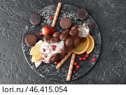 Delicious sweet bubble waffle on dark background. Стоковое фото, фотограф Pixel_shot / Фотобанк Лори