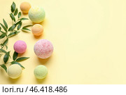 Bath bombs with plant branches on beige background. Стоковое фото, фотограф Pixel_shot / Фотобанк Лори