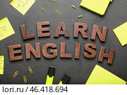 Composition with stationery and text LEARN ENGLISH on grey background. Стоковое фото, фотограф Pixel_shot / Фотобанк Лори