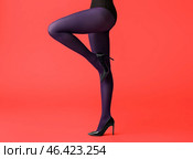 Beautiful young woman in tights on color background. Стоковое фото, фотограф Pixel_shot / Фотобанк Лори
