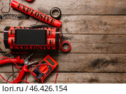 Bomb with tools on wooden background. Стоковое фото, фотограф Pixel_shot / Фотобанк Лори