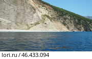 Adriatic sea, Budva, Montenegro 07.22.24 Seagull beach near Ratkova plage plaza. Stones, inaccessible rocks. Flysch marine rocks lithological layers. Sea boat ride. Boat Trip. Tourist Destination (2024 год). Редакционное видео, видеограф Юлия Петровская / Фотобанк Лори