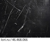 Поцарапанный черный фон, гранж текстура для дизайна. Стоковая иллюстрация, иллюстратор Наталья Игумнова / Фотобанк Лори