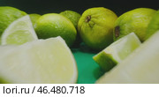 A vibrant display of fresh, green citrus fruits is beautifully presented for all to see. Стоковое видео, видеограф Владимир Ковальчук / Фотобанк Лори