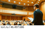 Speaker giving presentation at business conference in convention center. Стоковое AI-изображение, AI-художник Юрий Поздников / Фотобанк Лори
