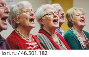 Senior choir singing with passion and enthusiasm. Стоковое AI-видео, аниматор Юрий Поздников / Фотобанк Лори