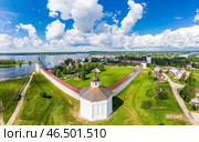 Aerial top view of ancient Kirillo Belozersky Monastery, fortress and lake Siverskoye on sunny summer day. Panoramic view to Church of the Transfiguration. Holy places, Kirillov, Vologda region Russia. Стоковое фото, фотограф Алексей Ширманов / Фотобанк Лори