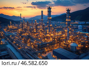 A large oil refinery or chemical plant in the evening. The plant installations, numerous pipelines and tall smokestacks are illuminated by thousands of lights, creating the effect of a futuristic industrial landscape. Mountains are visible in the distance, and the sky is painted in warm sunset tones, creating a contrast between nature and technological development. The atmosphere is filled with a sense of power, engineering progress and urban aesthetics. Стоковое AI-изображение, AI-художник Анна Кривицкая / Фотобанк Лори