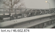 Road, metal barrier fencing. Road safety. fastening bolts. grey Дорога, металлическое барьерное ограждение. Безопасность на дороге. болты крепление. серый. Стоковое видео, видеограф Опока Алексей / Фотобанк Лори