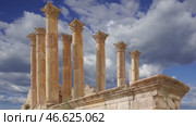 Temple of Zeus, Jordanian city of Jerash (Gerasa of Antiquity), capital and largest city of Jerash Governorate, Jordan. Against the background of a beautiful sky with clouds. 4K, time lapse, with zoom. Стоковое видео, видеограф Владимир Журавлев / Фотобанк Лори